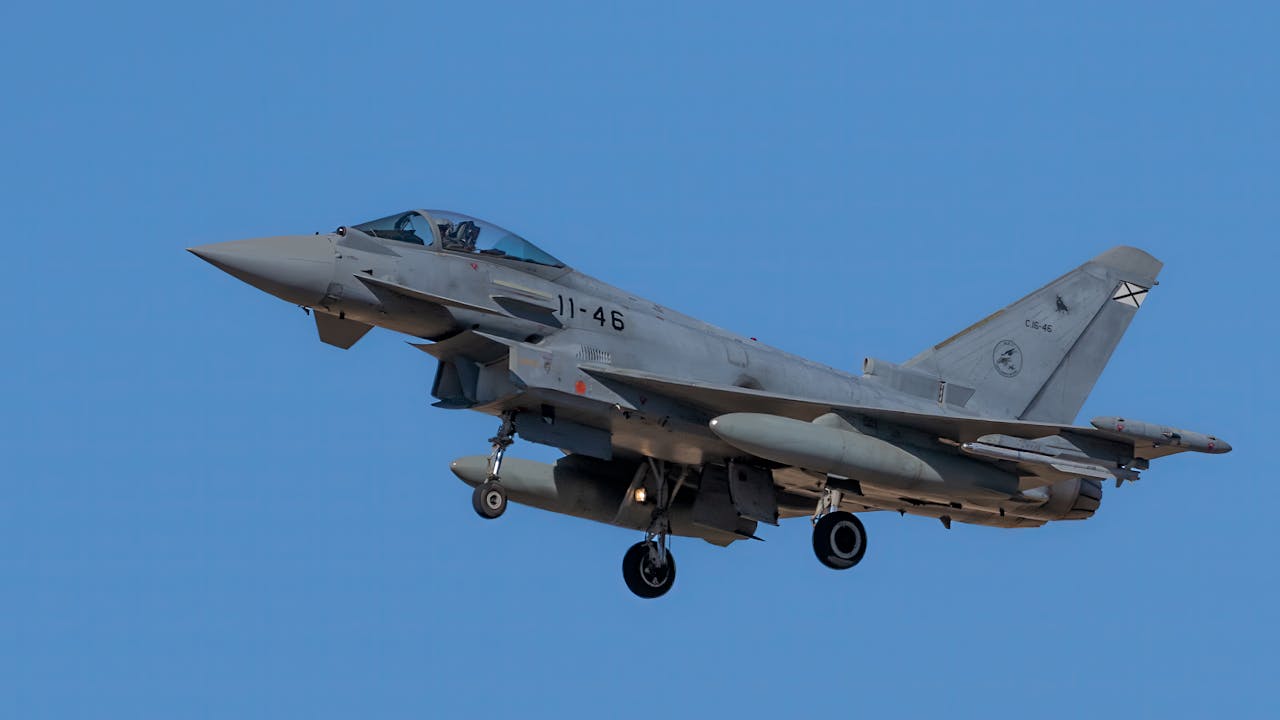 gallery-2 A Eurofighter Typhoon jet flying in clear skies above Los Llanos, Spain.