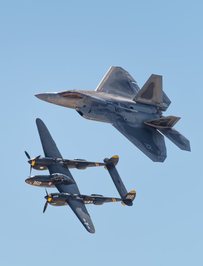 why-choose-us F-22 Raptor and P-38 Lightning perform a thrilling aerial show at Miramar, San Diego.